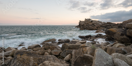 Panoramic view over the rocky Breton coast in the soft light of sunrise, France, Brittany, Finistere