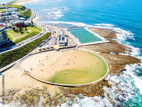 An aerial view of Newcastle beach and the ocean baths in New South Wales, Australia photo