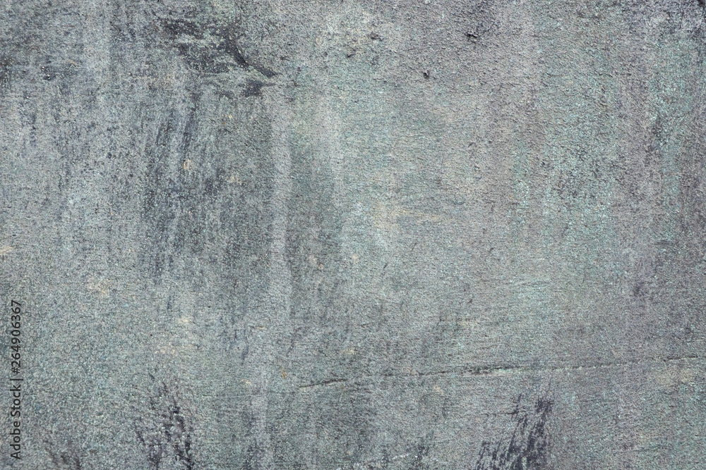 Obraz premium The rough surface of the bronze plate as a background