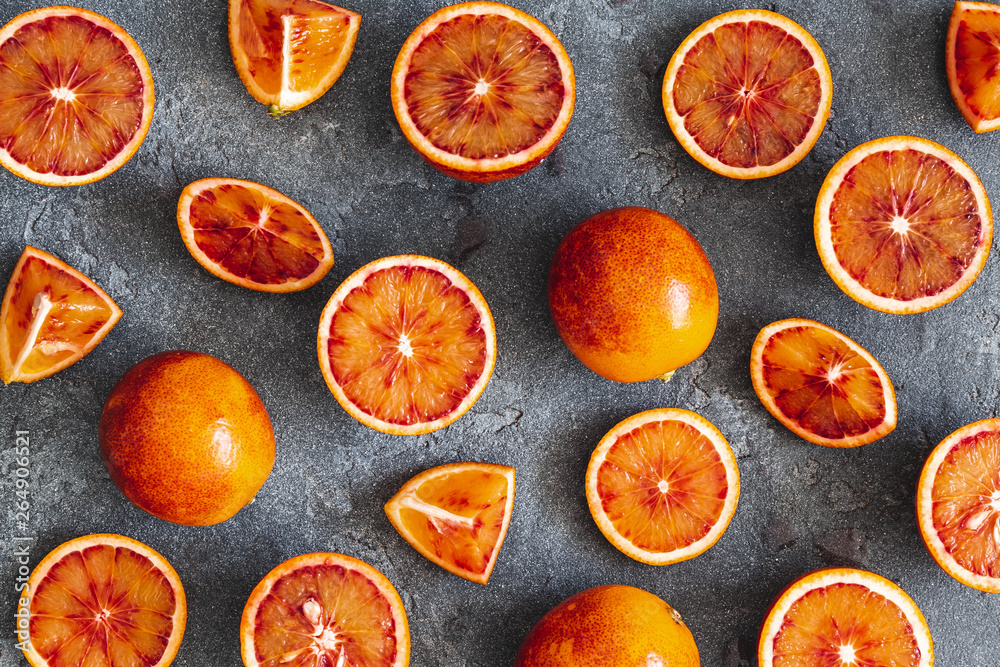 Red orange on black background. Flat lay, top view Red orange on black background. Flat lay, top view