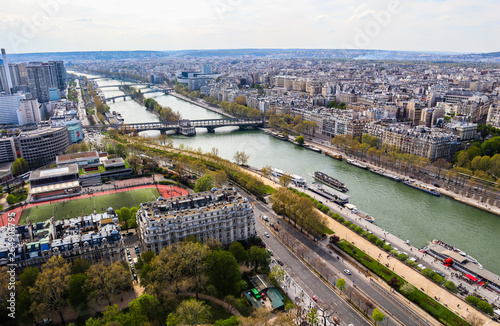 Aerial view of Paris city and Seine river from Eiffel Tower. France. April 2019 © OLAYOLA