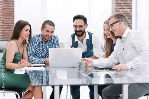 modern business team using a laptop in the workplace