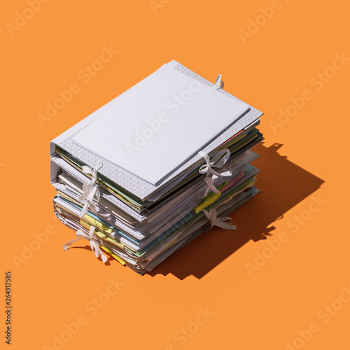 Pile of folders and paperwork photo