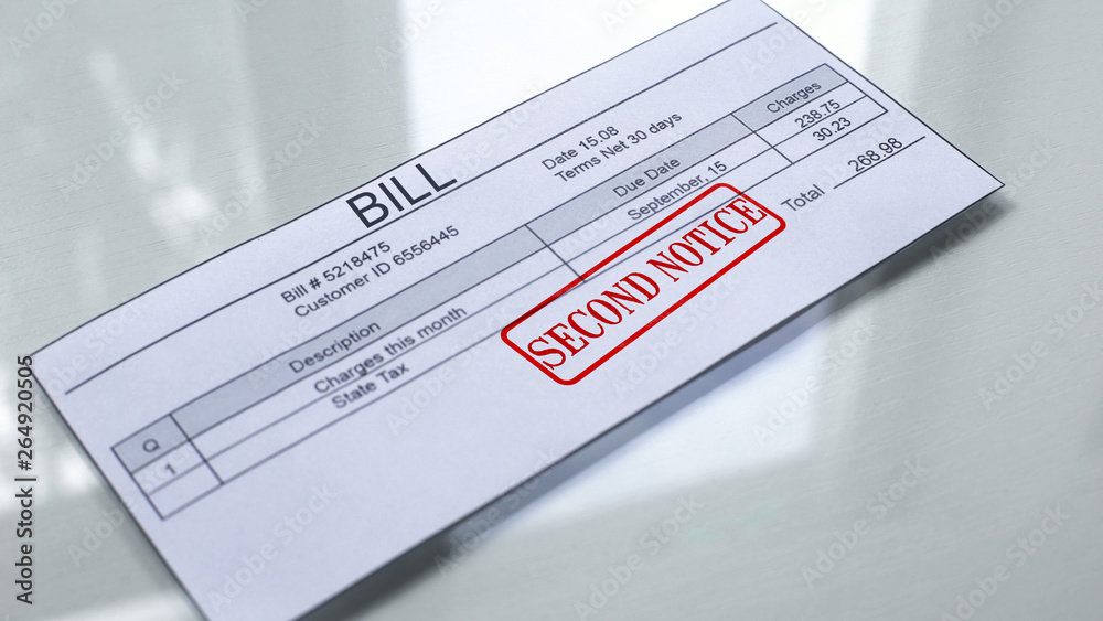Fototapeta premium Second notice seal stamped on bill, payment for services, month expenses tariff