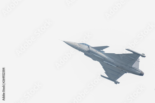 The Gripen plane above the horizon