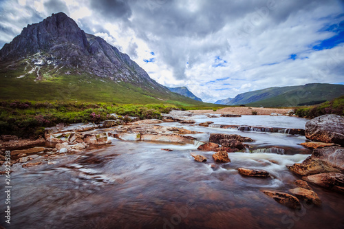 Beautiful river mountain landscape scenery in Glen Coe, Scottish Highlands, Scotland