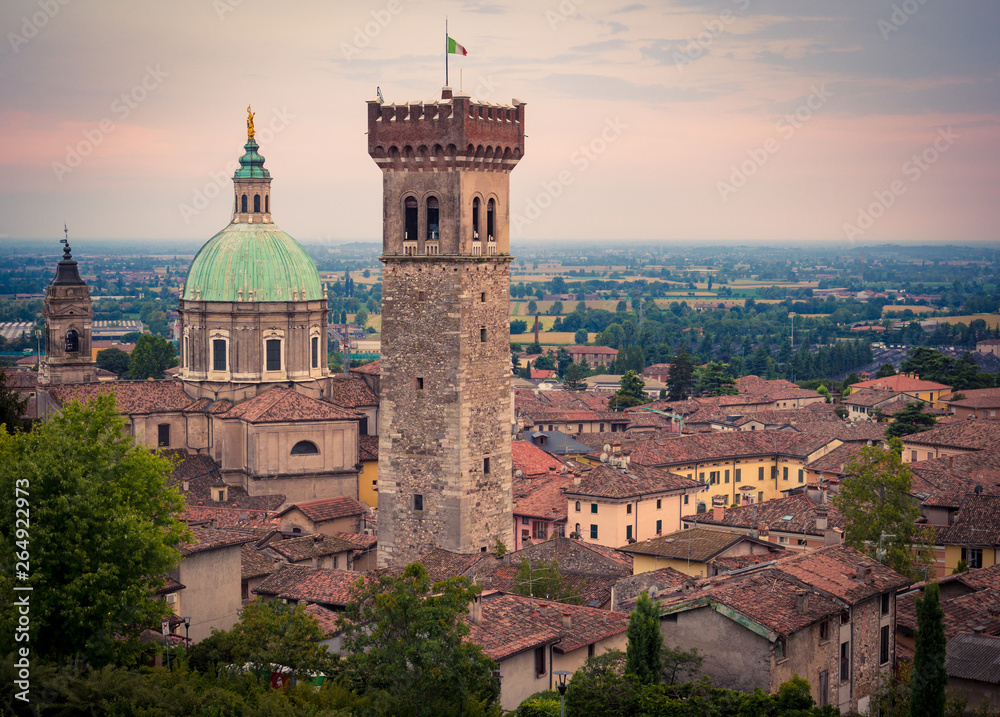 View of the medieval tower and the dome of the Cathedral in Lonato.