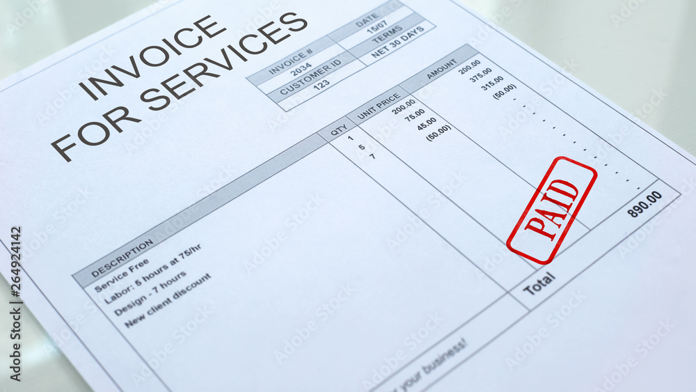 Paid seal stamped on invoice for services commercial document, business bill Paid seal stamped on invoice for services commercial document, business bill