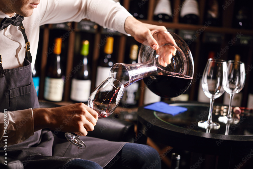 Staff training for sommelier experts. All that is needed is wine etiquette, the rules for buying wine for the customer, decanting and pouring wine into glasses.