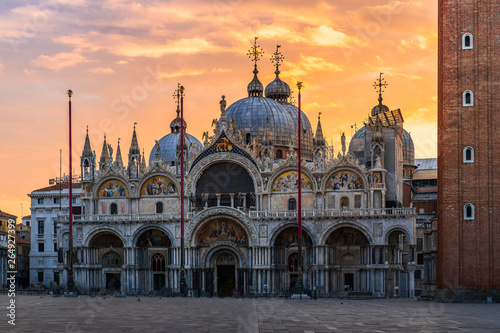 Fantastic sunset on San Marco square with Campanile and Saint Mark's Basilica. Colorful evening cityscape of Venice, Italy, Europe. Traveling concept background. Artistic style post processed photo.