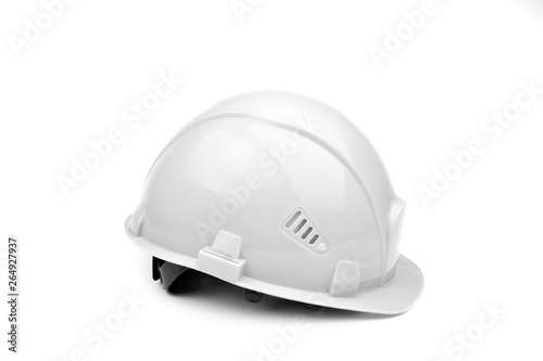 White construction helmet on a light background. The concept of architecture, construction, engineering, design. Copy space.