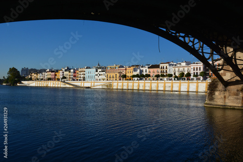 the triana district along the guadalquivir river Seville, Spain © corradobarattaphotos