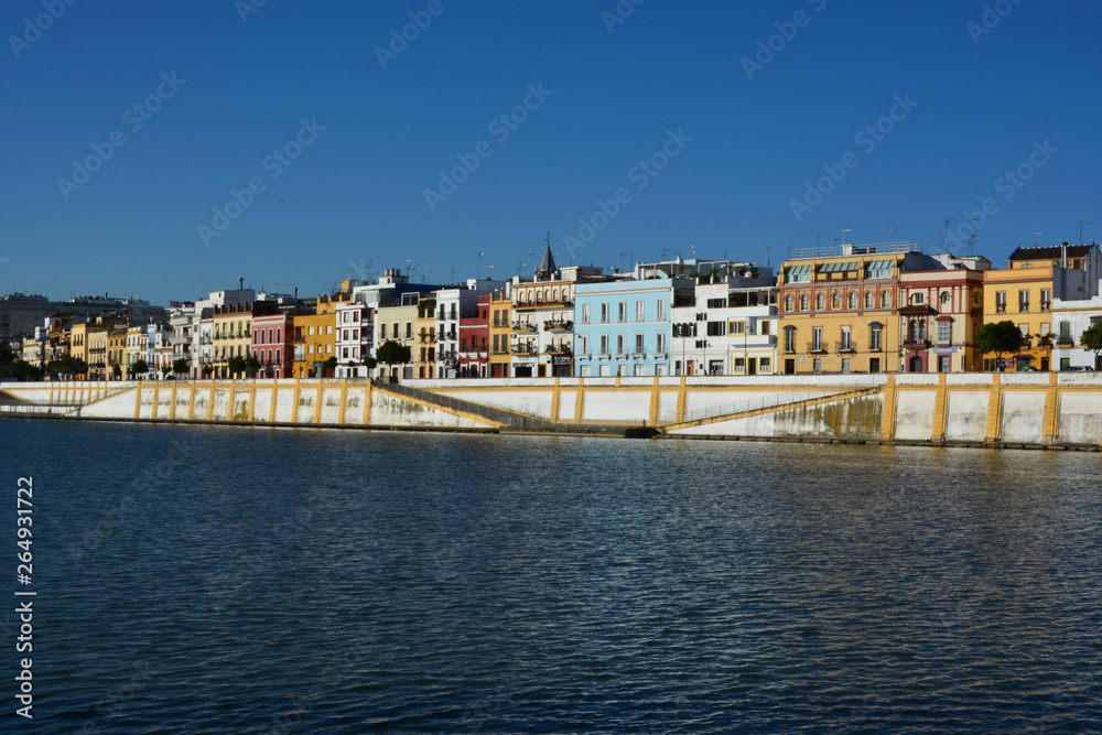 The colorful and picturesque district of Triana on the banks of the Guadalquivir river, in Seville, Spain