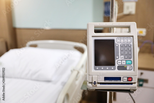 dialysis machine with bed in hospital background