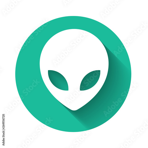 White Alien icon isolated with long shadow. Extraterrestrial alien face or head symbol. Green circle button. Vector Illustration