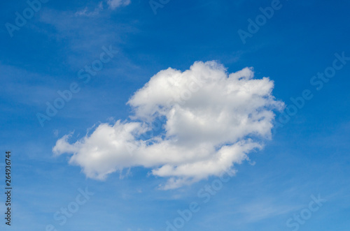 beautiful lonely white cloud on blue sky. Background.