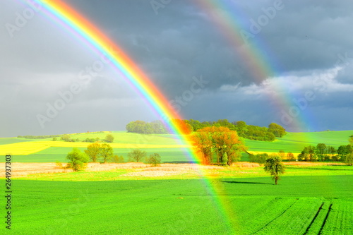 doppelter Regenbogen über der Eifel photo