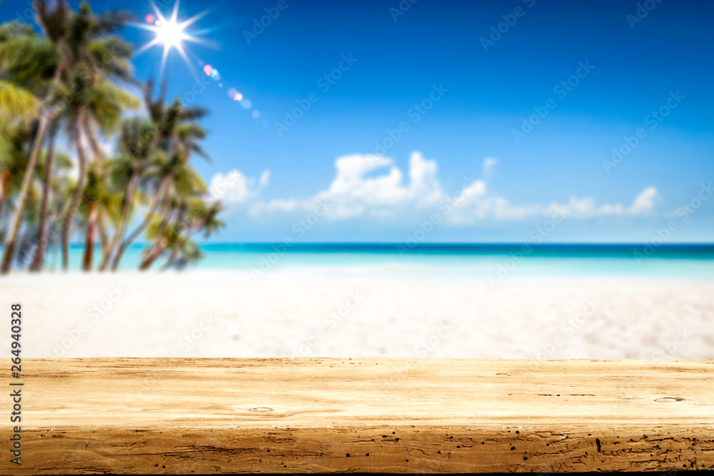 Fototapeta premium Summer table background of free space for your decoration and landscape of beach with palms. 