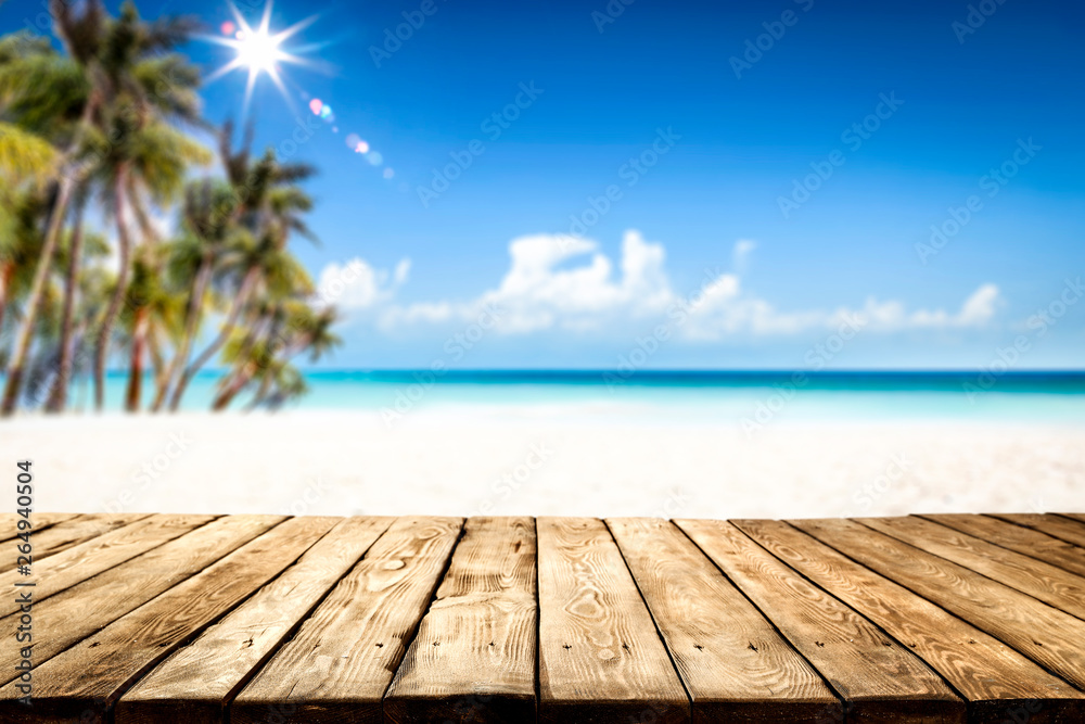 Summer table background of free space for your decoration and landscape of beach with palms. Summer table background of free space for your decoration and landscape of beach with palms.