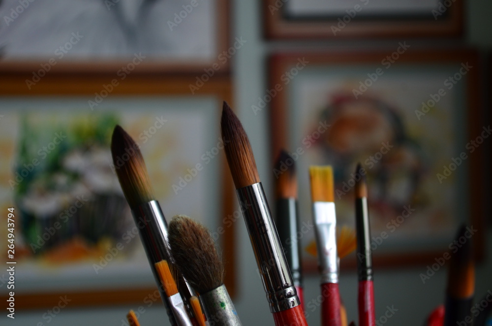 artistic brushes of different shapes and numbers on the background of
