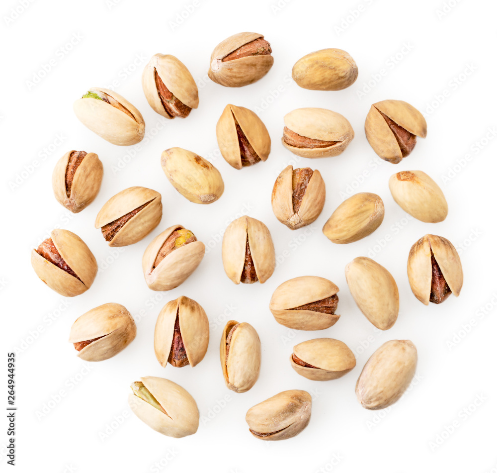 Salted pistachios on a white, isolated. The form of the top. Salted pistachios on a white, isolated. The form of the top.