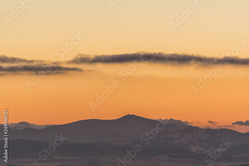 Lysa peak in winter time on sunrise. View from Fulnek Vrchy  Czech Republic