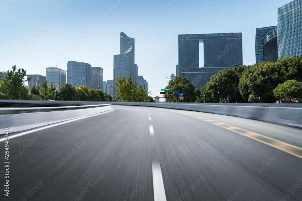 Obraz premium Empty road floor surface with modern city landmark buildings of hangzhou bund Skyline,zhejiang,china