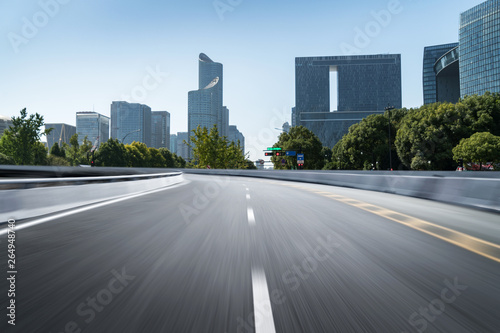 Empty road floor surface with modern city landmark buildings of hangzhou bund Skyline zhejiang china