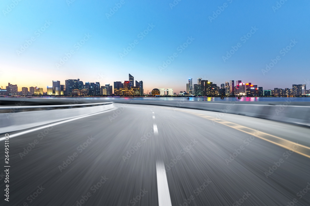 Empty road floor surface with modern city landmark buildings of hangzhou bund Skyline,zhejiang,china Empty road floor surface with modern city landmark buildings of hangzhou bund Skyline,zhejiang,china