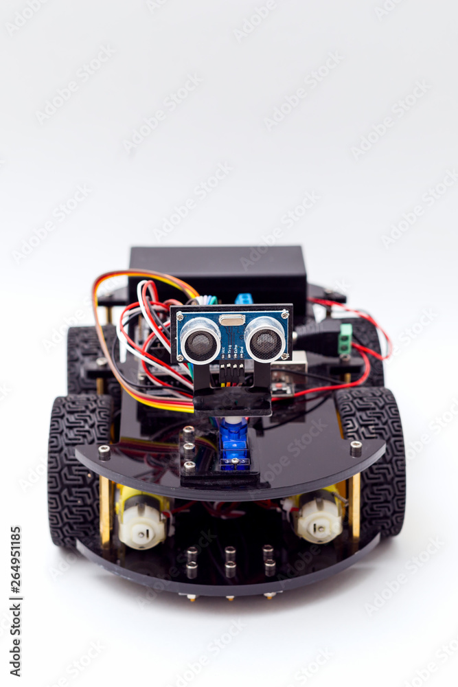 Robot on wheels white background. Vertical Robot on wheels white background. Vertical