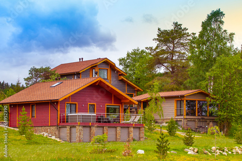 Group of country cottages. ...