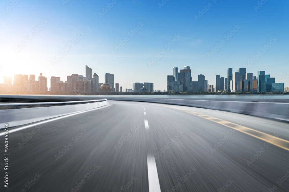 Empty road floor surface with modern city landmark buildings of hangzhou bund Skyline,zhejiang,china Empty road floor surface with modern city landmark buildings of hangzhou bund Skyline,zhejiang,china
