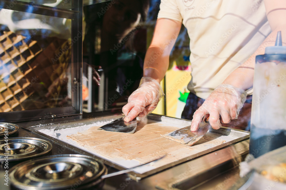 stir-fried ice cream rolls at freeze pan. Organic, natural rolled ice cream, hand made dessert.