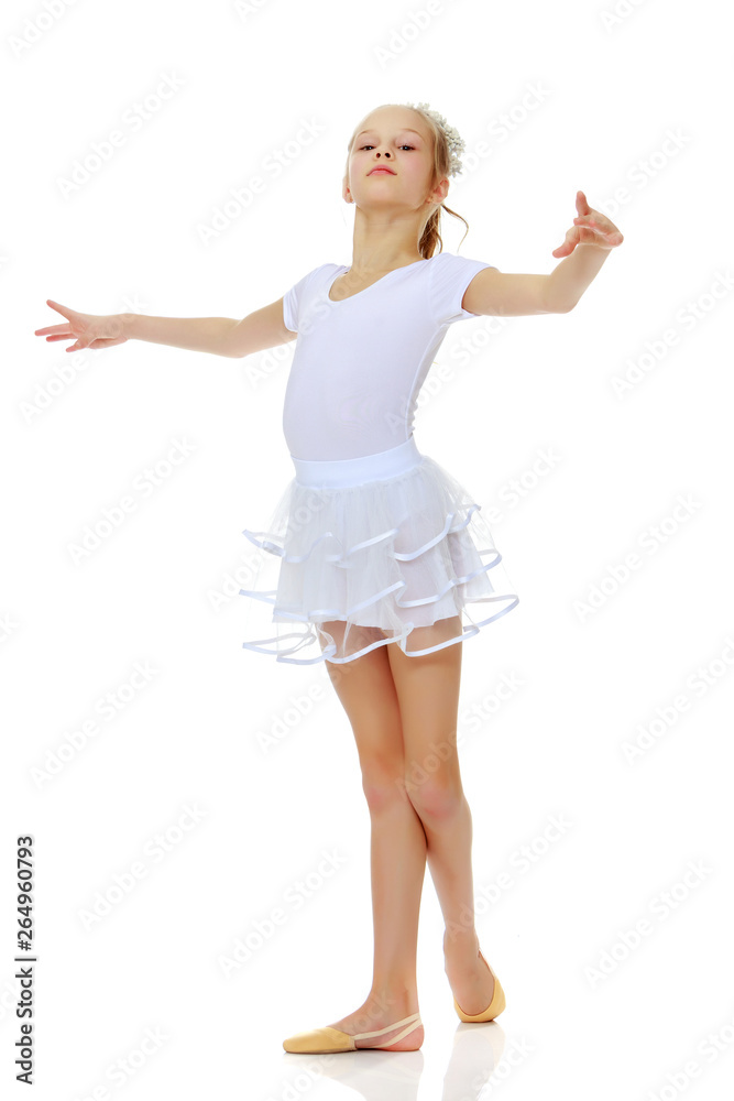 Little girl in gymnastics leotard.