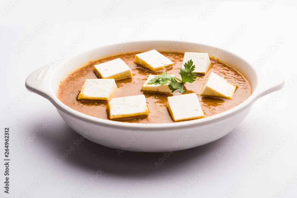 Paneer butter masala or Panir makhanwala, served in a bowl. selective focus Paneer butter masala or Panir makhanwala, served in a bowl. selective focus