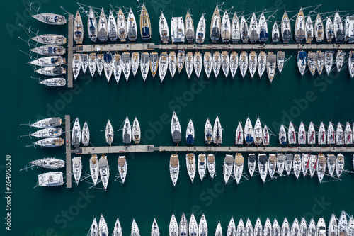Photography Aerial view of a lot of white boats and yachts moored in marina