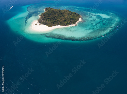 Aerial drone view of beautiful tropical Bamboo Island in Thailand