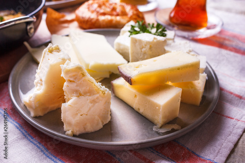 Traditional white feta cheese on plate for turkish breakfast