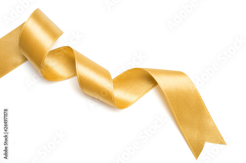 Gold ribbon in roll on white