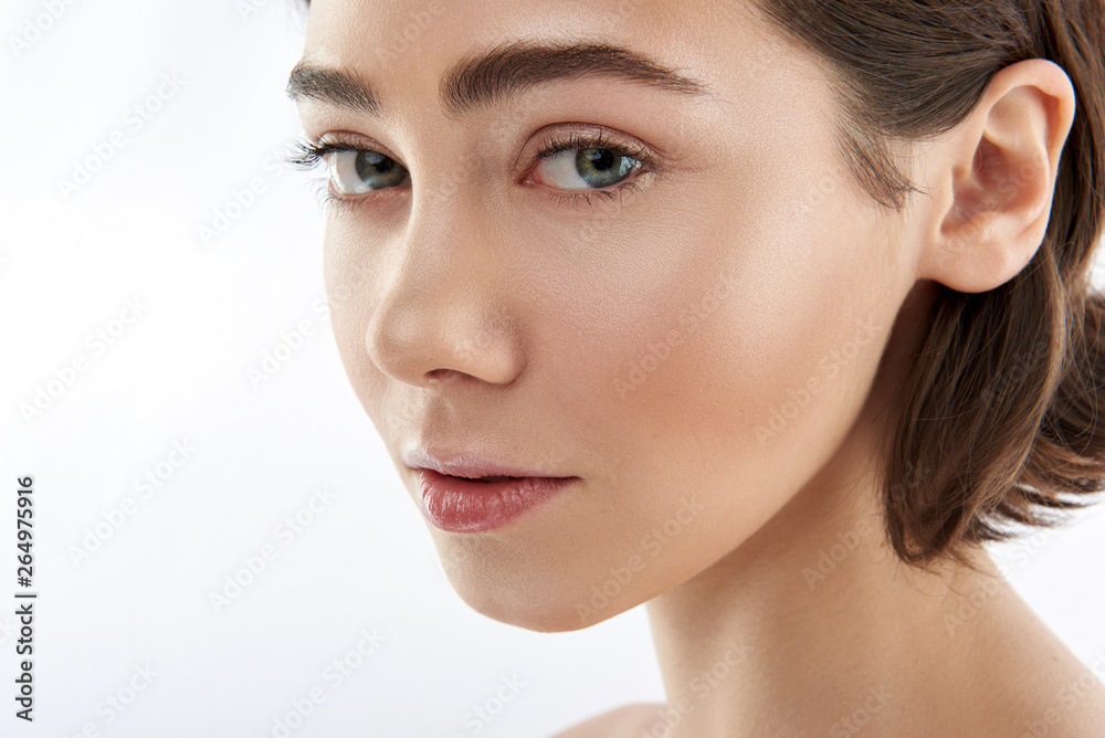 Portrait of pretty green eyed brunette female Portrait of pretty green eyed brunette female