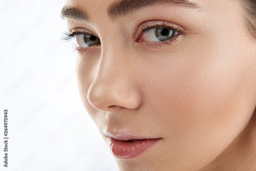 Fototapeta premium Portrait of pretty female with green eyes