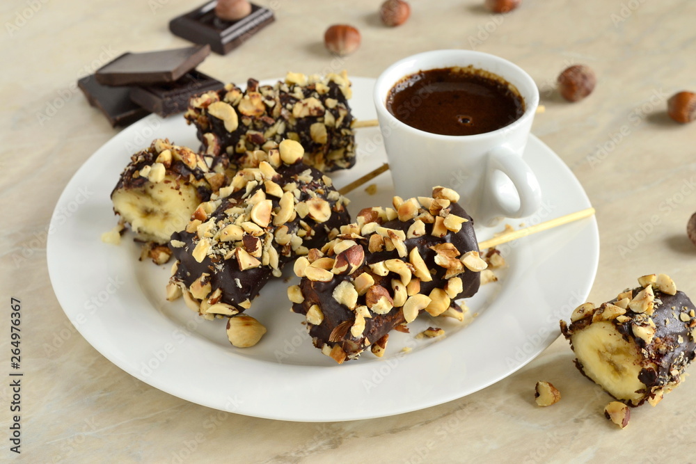 Frozen banana in chocolate and hazelnuts Frozen banana in chocolate and hazelnuts