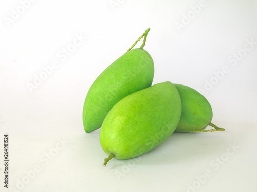 green mango on a white background