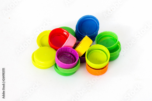 colorful plastic bottles caps for recycling To help save the world concept