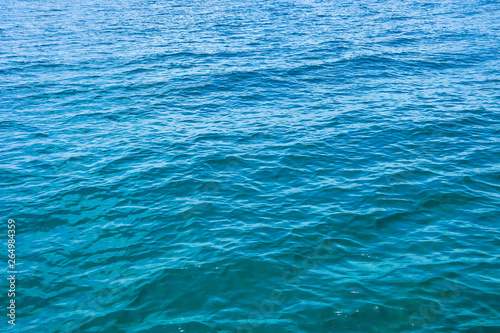 Surface of a ocean beach water in Phu Quoc Vietnam in daylight | Calm waves