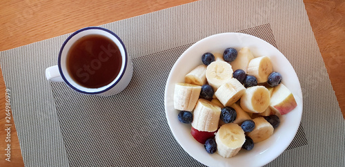 A bowl with fresh fruits - healthy nutrition concept