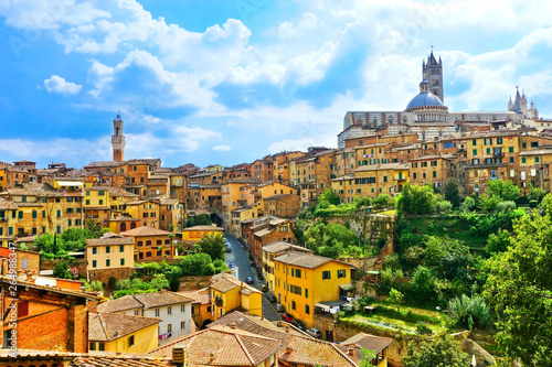 View of the historic cityscape of Siena in Tuscany, Italy.