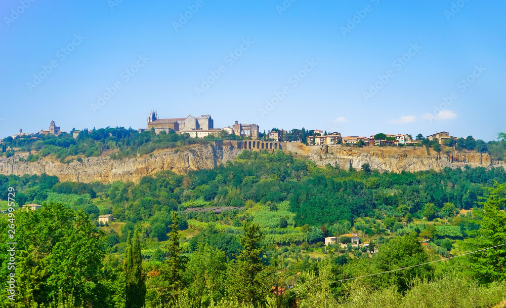 View of the historic cityscape located on the hill in Orvieto, Italy.