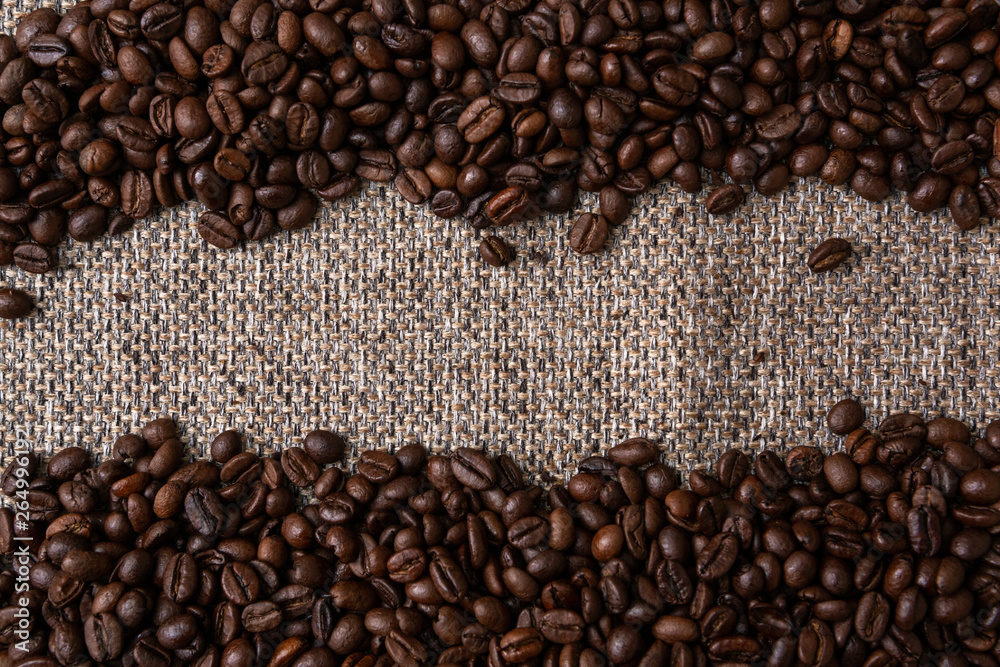 Coffee beans and sackcloth background., place for text Coffee beans and sackcloth background., place for text
