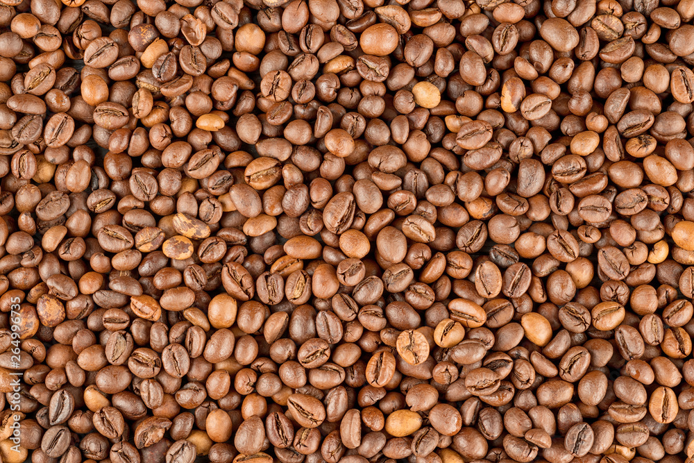 Raw coffee beans texture and background Raw coffee beans texture and background